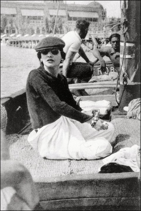 1936, Gabrielle Chanel on Roussy Sert´s yatch in front of the Lido of Venice Photo V.H. Grandpierre © 1936, Gabrielle Chanel on Roussy Sert´s yatch in front of the Lido of Venice Photo V.H. Grandpierre ©